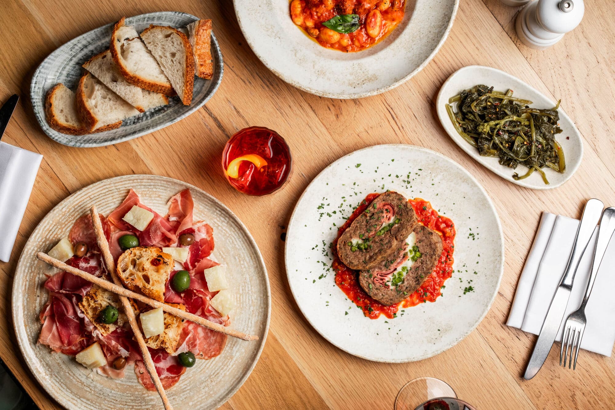 A table with delicious Italian dishes at Riva Blu Leeds